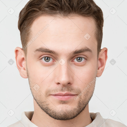 Neutral white young-adult male with short  brown hair and grey eyes