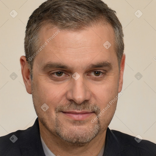 Joyful white adult male with short  brown hair and brown eyes