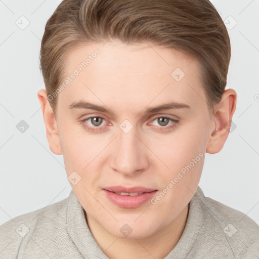 Joyful white young-adult female with short  brown hair and grey eyes