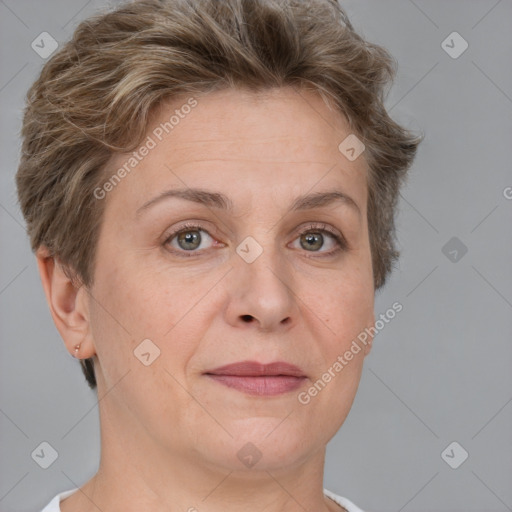 Joyful white adult female with short  brown hair and grey eyes