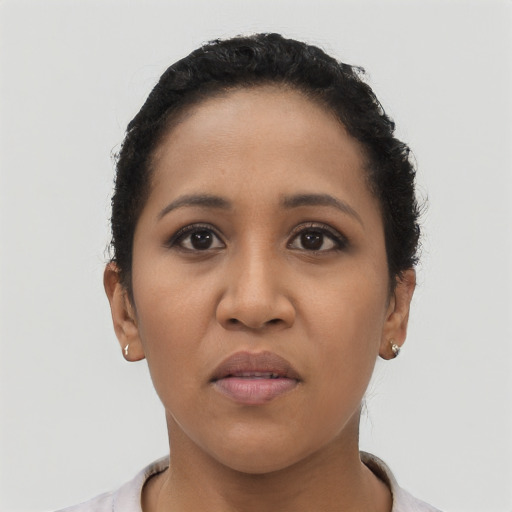 Neutral latino young-adult female with short  black hair and brown eyes