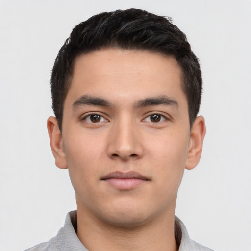 Neutral white young-adult male with short  black hair and brown eyes