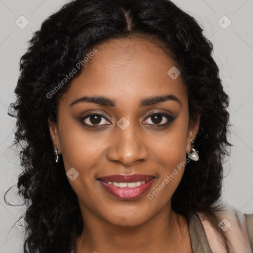 Joyful black young-adult female with long  brown hair and brown eyes