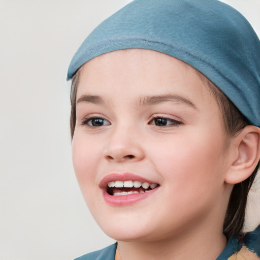 Joyful white child female with long  brown hair and brown eyes