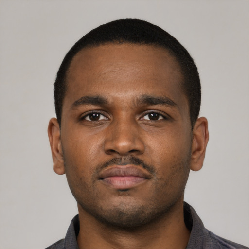 Neutral black young-adult male with short  brown hair and brown eyes
