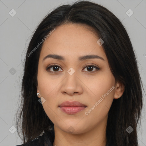 Joyful latino young-adult female with long  brown hair and brown eyes