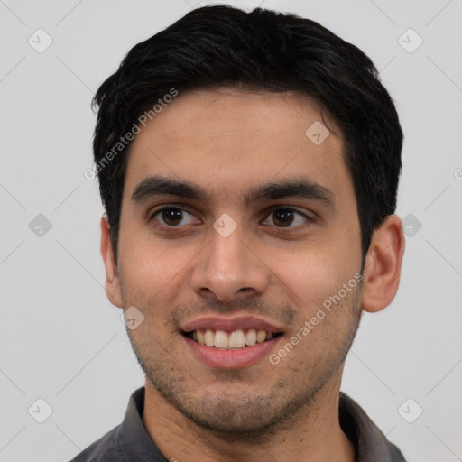 Joyful white young-adult male with short  black hair and brown eyes