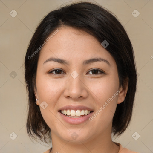 Joyful latino young-adult female with medium  brown hair and brown eyes