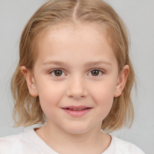 Joyful white child female with medium  brown hair and brown eyes