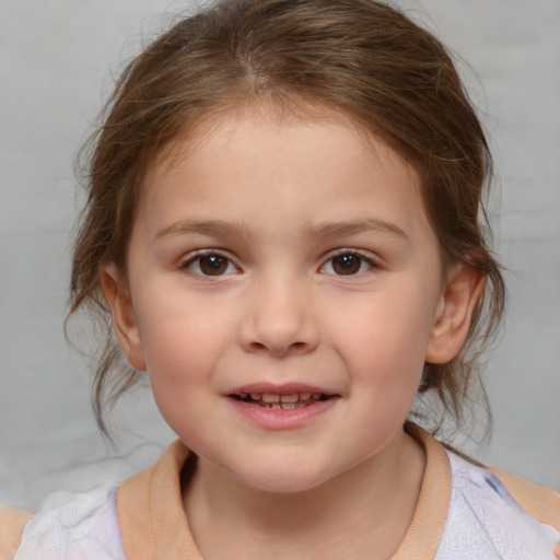 Joyful white child female with medium  brown hair and brown eyes