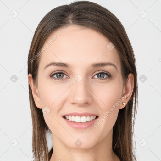 Joyful white young-adult female with long  brown hair and grey eyes