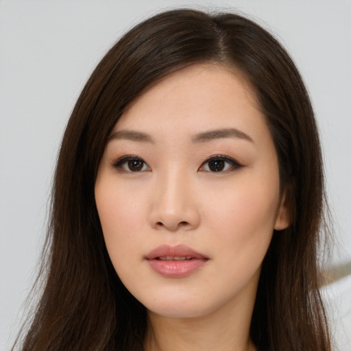 Neutral asian young-adult female with long  brown hair and brown eyes