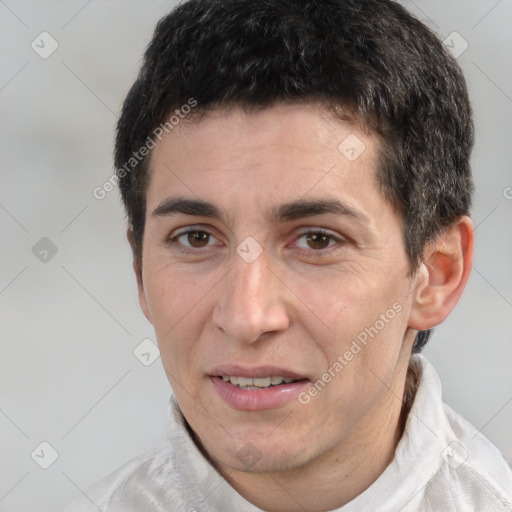 Joyful white adult male with short  brown hair and brown eyes