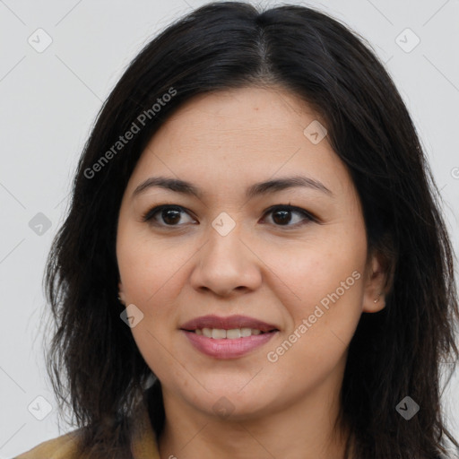 Joyful asian young-adult female with long  brown hair and brown eyes