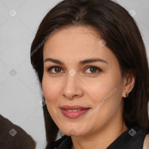 Joyful white adult female with medium  brown hair and brown eyes