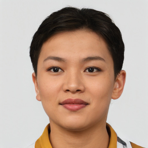 Joyful asian young-adult female with short  brown hair and brown eyes