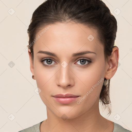 Neutral white young-adult female with medium  brown hair and brown eyes