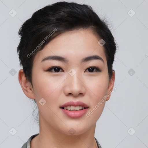 Joyful asian young-adult female with short  brown hair and brown eyes