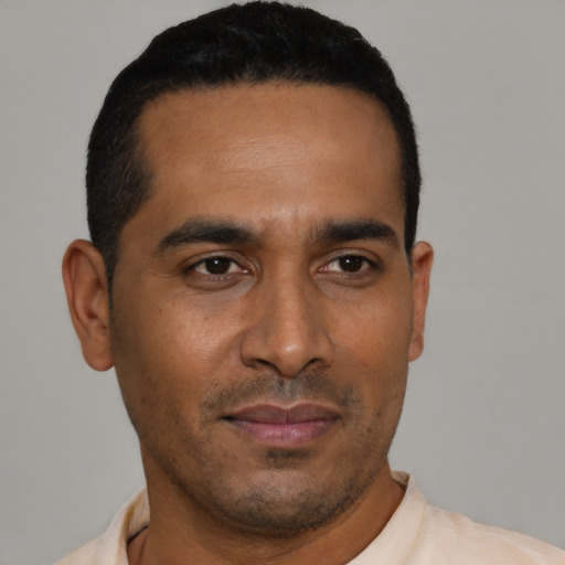 Neutral latino young-adult male with short  black hair and brown eyes