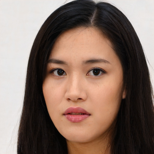 Neutral asian young-adult female with long  black hair and brown eyes