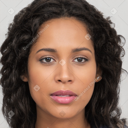 Joyful latino young-adult female with long  brown hair and brown eyes