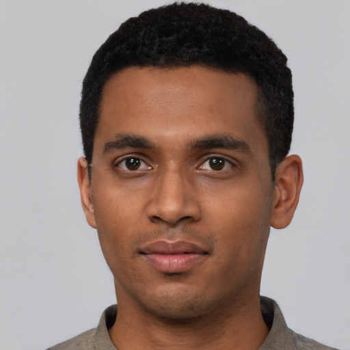 Neutral black young-adult male with short  black hair and brown eyes