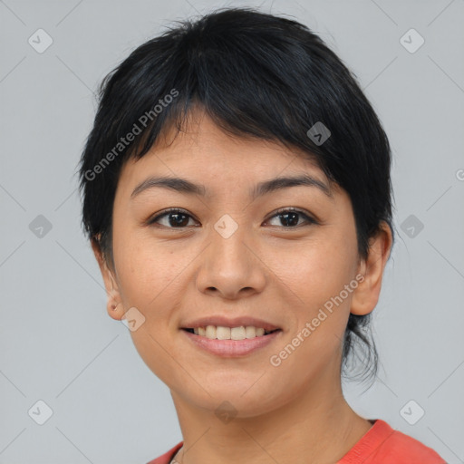 Joyful asian young-adult female with medium  black hair and brown eyes