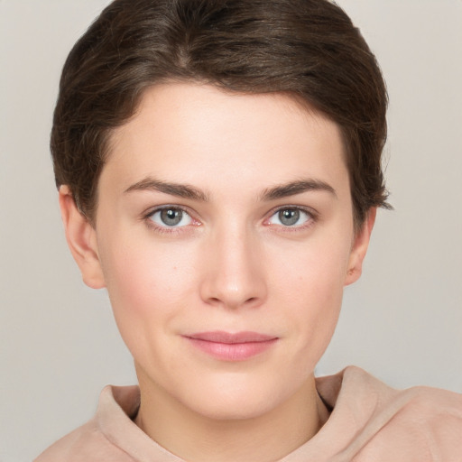 Neutral white young-adult female with short  brown hair and grey eyes