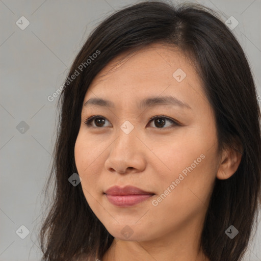 Joyful asian young-adult female with long  brown hair and brown eyes