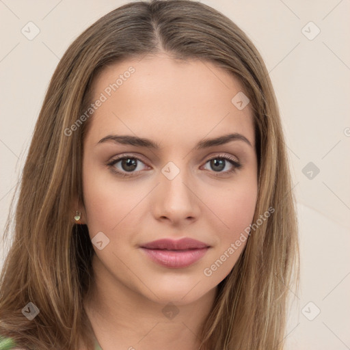 Neutral white young-adult female with long  brown hair and green eyes