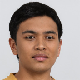 Neutral asian young-adult male with short  brown hair and brown eyes