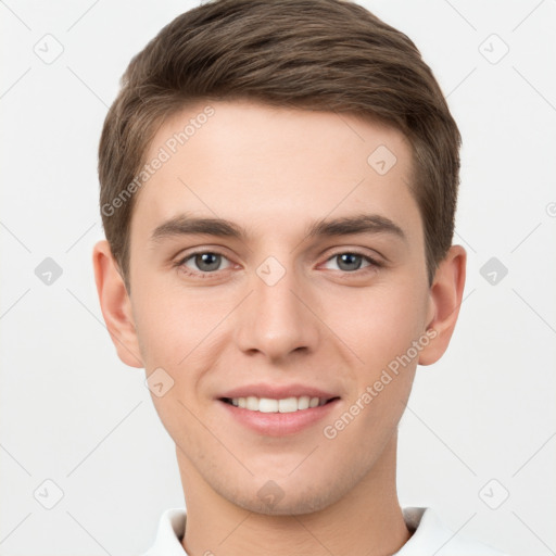 Joyful white young-adult male with short  brown hair and brown eyes