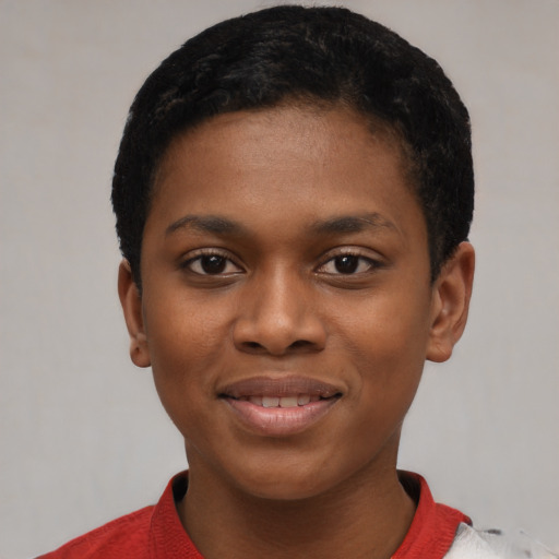 Joyful black young-adult female with short  black hair and brown eyes