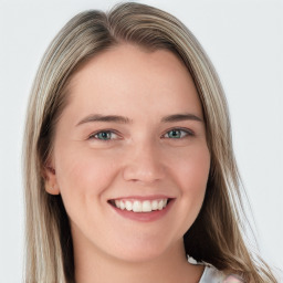 Joyful white young-adult female with long  brown hair and blue eyes