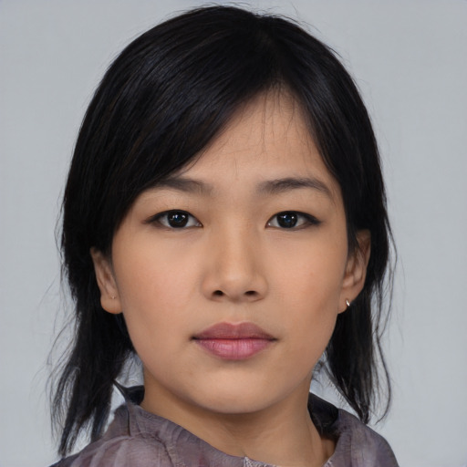 Neutral asian young-adult female with medium  black hair and brown eyes