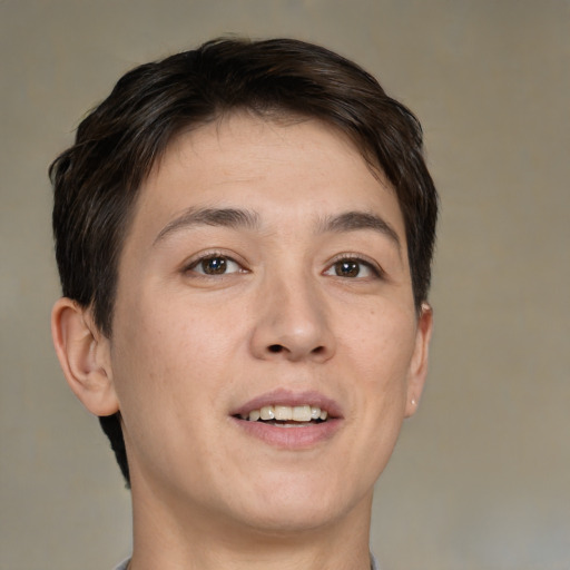 Joyful white adult male with short  brown hair and brown eyes