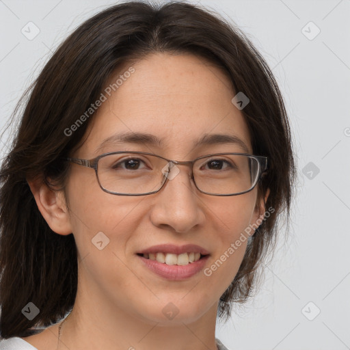 Joyful white adult female with medium  brown hair and brown eyes