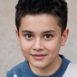 Joyful white child male with short  brown hair and brown eyes