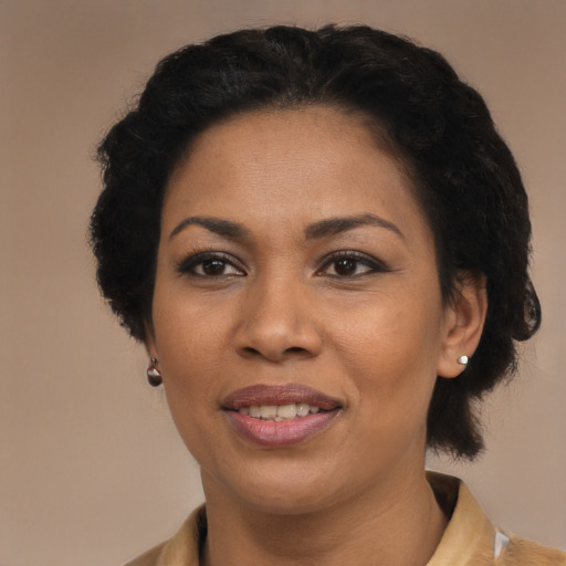 Joyful latino adult female with short  brown hair and brown eyes