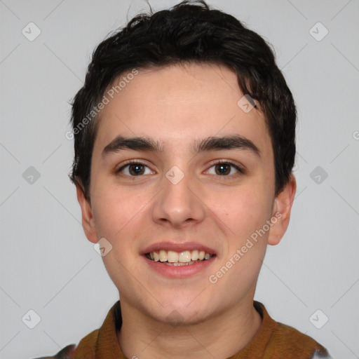 Joyful white young-adult male with short  black hair and brown eyes