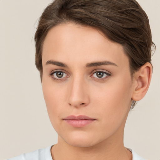 Neutral white young-adult female with short  brown hair and brown eyes