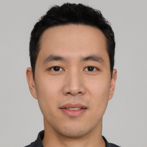 Neutral asian young-adult male with short  black hair and brown eyes