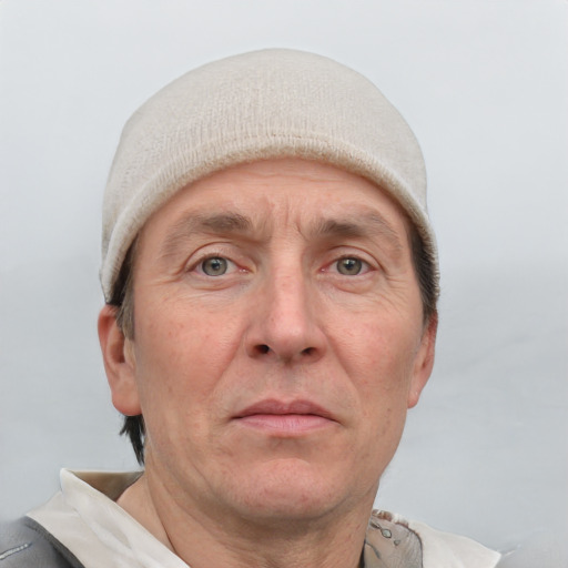 Neutral white adult male with short  brown hair and grey eyes