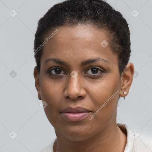 Joyful black young-adult female with short  brown hair and brown eyes