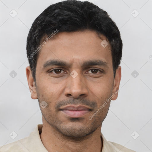 Neutral latino young-adult male with short  black hair and brown eyes