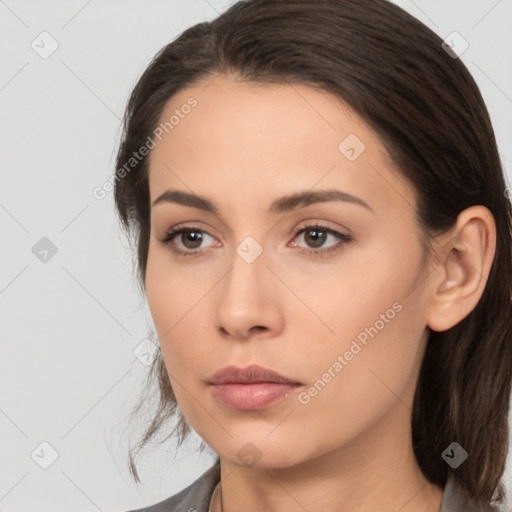 Neutral white young-adult female with medium  brown hair and brown eyes