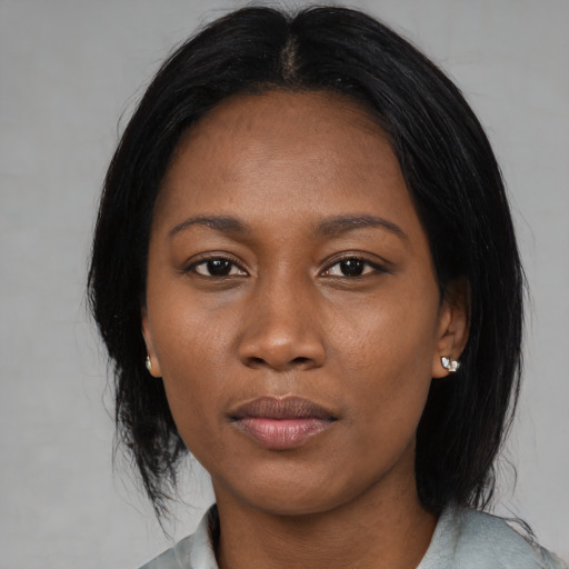 Neutral asian young-adult female with medium  black hair and brown eyes