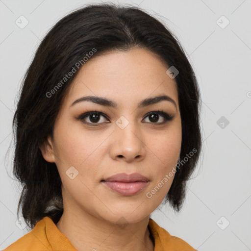 Joyful latino young-adult female with medium  brown hair and brown eyes