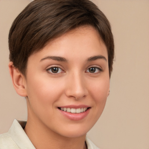 Joyful white young-adult female with short  brown hair and brown eyes