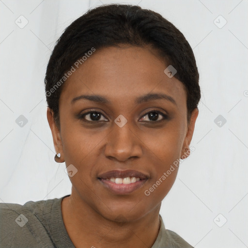 Joyful black young-adult female with short  brown hair and brown eyes